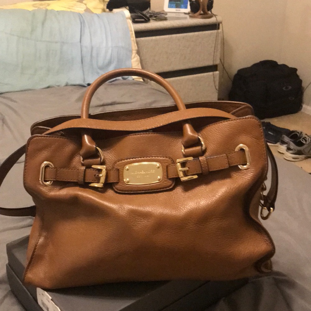 Leather purse by Michael Kors